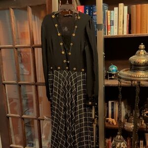 Black Long Dress with Gold Grommet Detail and Geometric Skirt